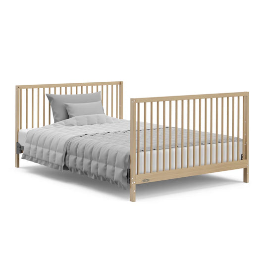 Teddi 5-in-1 convertible baby bed with Teddi storage