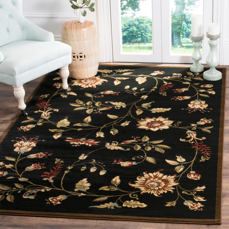 Carolane Black Area Rug 8'9” x12’